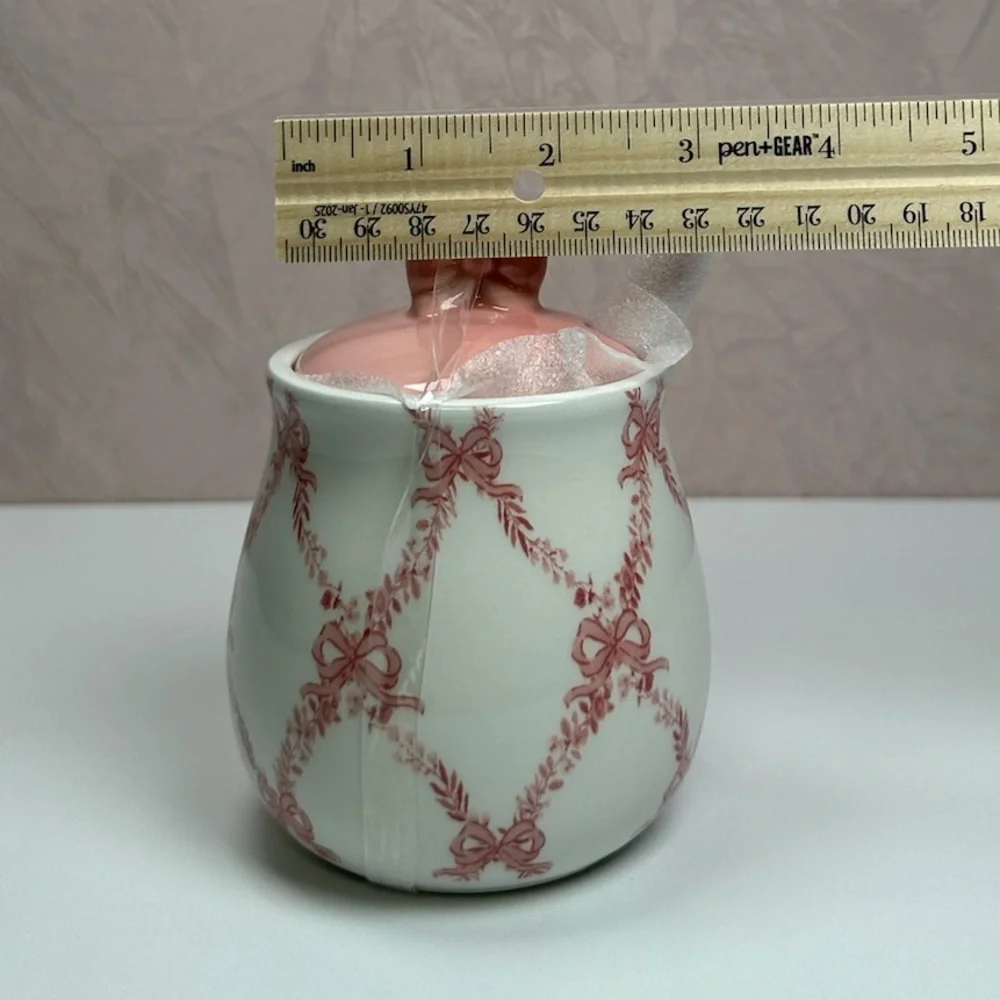Elegant Pink and White Ceramic Sugar Bowl with Bow Accents